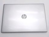 a laptop that is sitting on a white table