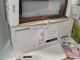 a box that has a microwave in it on a table
