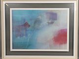 tableau accroché au mur d'une pièce, encadré de blanc et représentant un motif bleu et rouge