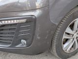 a close up of the front bumper of a car