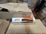 a box of batteries sitting on top of a cardboard box