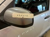 a sticker on the side mirror of a car