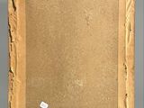 an old picture frame with a piece of paper taped to it