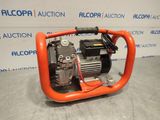 a small air compressor with a hose attached to it