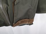 a close up of a jacket with a zipper on it