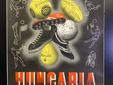 a poster on the wall of a tennis court