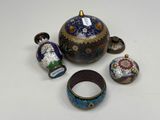 several pieces of cloise glass and other items on a white surface