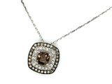 a close up of a necklace with a brown and white diamond on it
