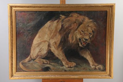 an oil painting of a lion on a easel in front of a white wall