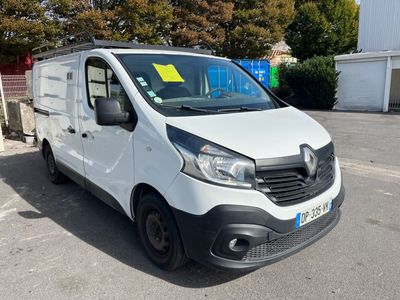the white van is parked in the parking lot with a price tag on it ' s side