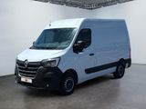 la photo d'une camionnette blanche garée dans un garage