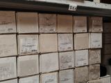 many boxes on the shelves in the warehouse
