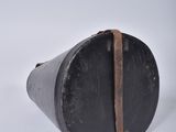a black object with a leather band on it