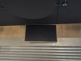 a picture of a ceiling mounted speaker in a room