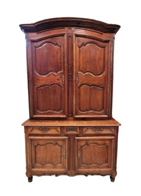 BUFFET deux-corps en merisier teinté et chêne mouluré à ress…