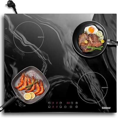 three pans with food cooking on a black stove top