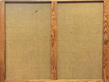 an image of an old wooden frame with a cork board on it