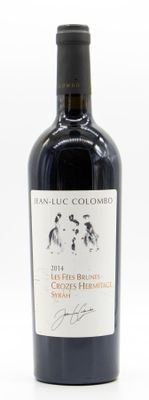 a picture of a bottle of wine with a dog on it