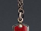 an image of a red tag with the letter a on it