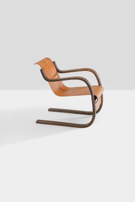 an image of a pair of wooden chairs on a white surface