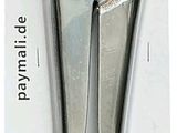 une image représentant une paire de pinces dans un emballage