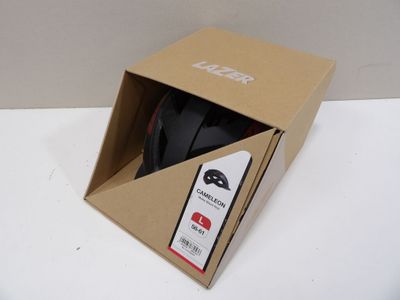 a box with a mouse inside of it on a table
