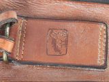 a close up of a leather belt with a buckle on it