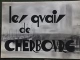 a black and white photo of a poster on a table