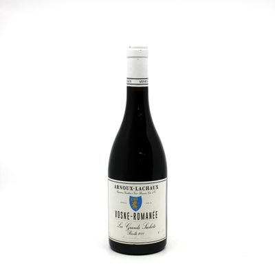a bottle of wine that is sitting on a table