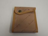 wallet case made out of brown fabric with writing on it
