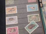 a book with stamps on it sitting on a table