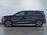 the side view of a black volvo suv parked in a parking lot