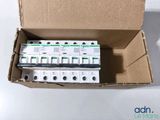 a box with four circuit breakers inside of it