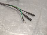 two wires that are connected to a wire on a table