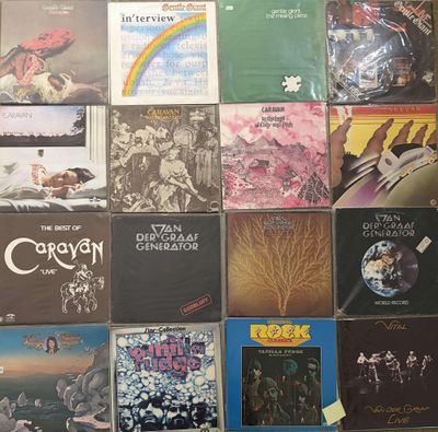 a lot of different album covers on the wall
