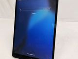 an image of a tablet computer with a blue screen on top of it