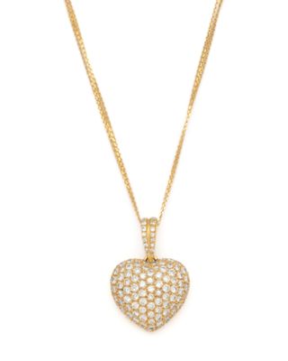 a diamond heart pendant on a gold chain