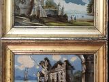 deux tableaux encadrés représentant un château et un château avec un autre château en arrière-plan