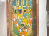 a picture of a picture of a pinball game in a wooden frame