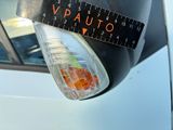 a close up of a parking meter with a tape on it