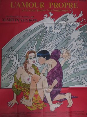 une vieille affiche de cinéma représentant deux femmes assises sur une plage