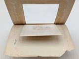 a picture of a piece of paper on top of a cardboard box