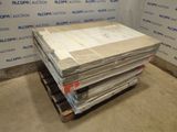 a stack of boxes sitting on a pallet in a warehouse