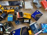 a lot of different types of electronics on the floor
