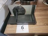 a machine that is sitting on a table with a number on it