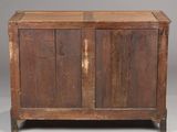 an old wooden chest with two doors and two drawers