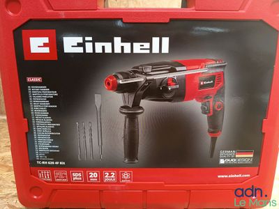 an image of a box with a drill in it sitting on a table