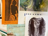 many books on the table with pictures on them