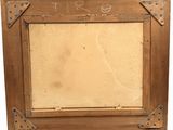 an old picture frame with a picture of a dog on it