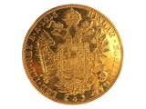 une image d'une pièce d'or sur fond blanc